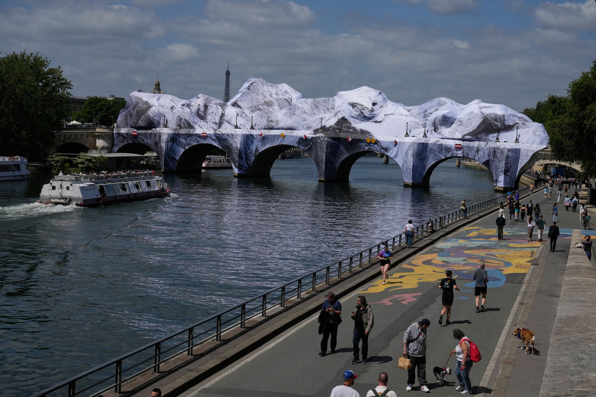Jr Installations Artist JR, the 'French Banksy' creates a 'cave' installation over Paris ...