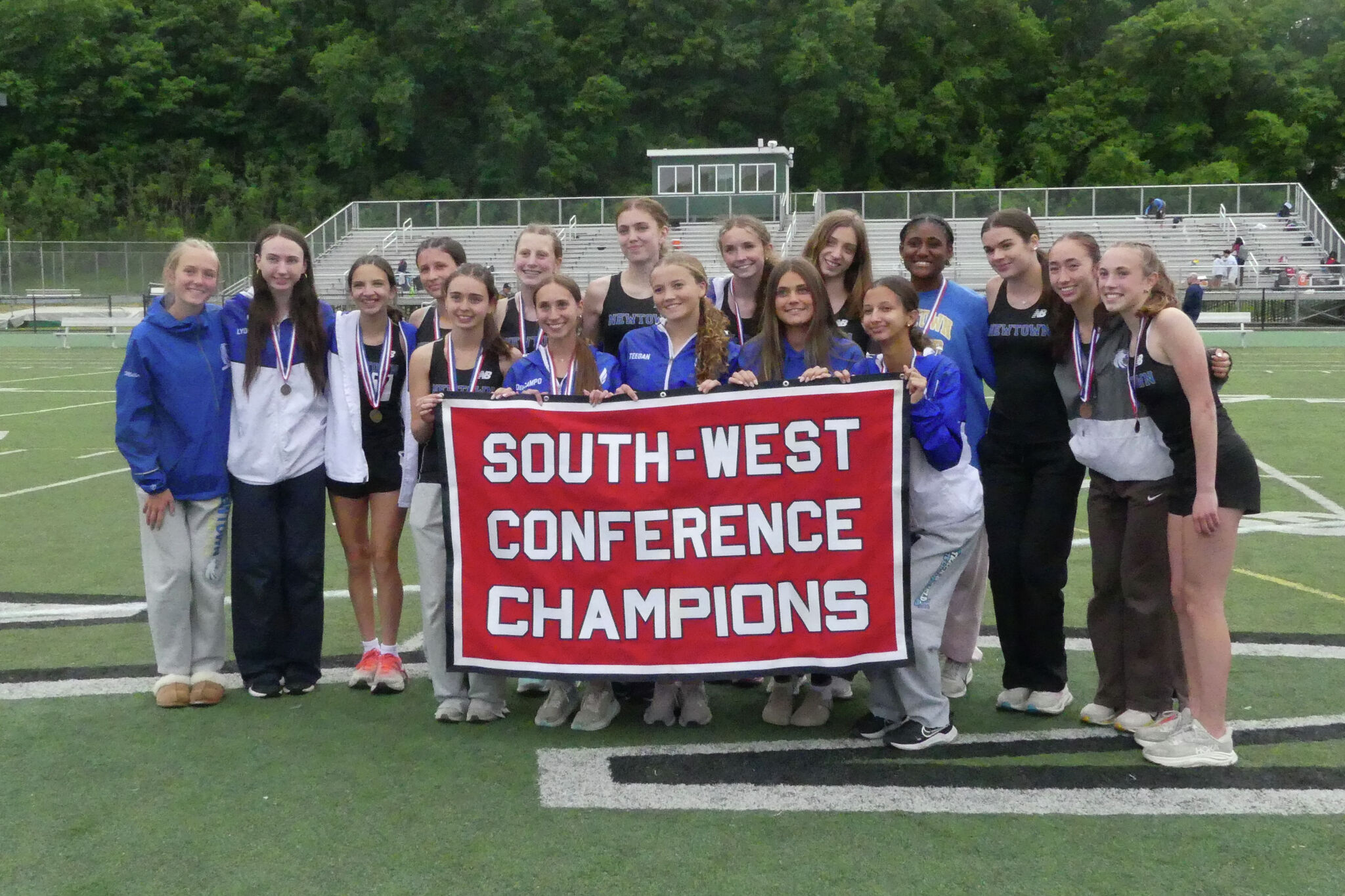 Newtown girls, Bethel boys repeat as SWC outdoor track and field champions