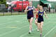 From front to back, Weston's Abigail Winslow, New Fairfield's Katie McMorrow and Pomperaug's Madelyn Mariani run in the 1,600 at the South-West Conference outdoor track and field championships on Thursday, May 21, 2026, in New Milford.