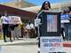 Nastasha Evans, a patient access nurse for Alameda Hospital, speaks at a demonstration against federal cuts to healthcare in East Oakland, Calif., on Thursday, May 21, 2026. H.R. 1, also known as the "Big Beautiful Bill" is expected to cut around $1 trillion in healthcare funding, and 2 million Californians could lose Medi-Cal coverage as a result of this legislation. (Tanay Gokhale/Bay City News)
