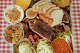 A platter with brisket, sausage, turkey, ribs, homemade brioche, sides and desserts at Goldee's Barbecue in Fort Worth.