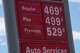 The per-gallon prices for different grades of gasoline are posted outside a Conoco station Thursday, May 14, 2026, in Denver.