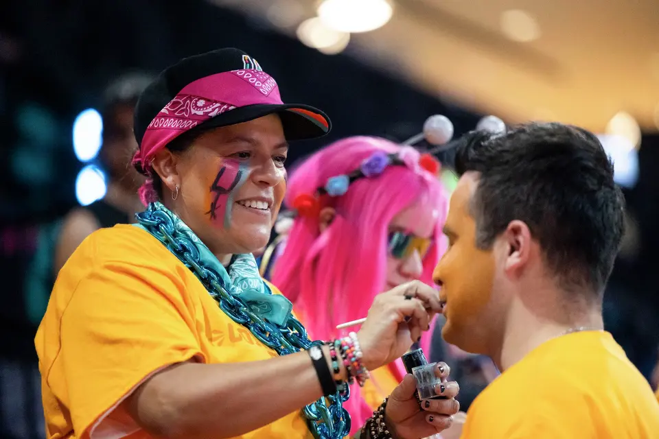 Jennifer Montes paints the face of Matthew Vasquez prior to the start of Game 3 of the Western Conference Finals at Frost Bank Center in San Antonio on Friday, May 22, 2026.