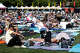 People lay out on their blankets in the sun near the Prudential Stage during the first day of the BottleRock Music Festival held at the Napa Valley Expo in Napa, Calif. Friday, May 22, 2026.