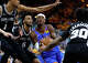 Oklahoma City Thunder guard Shai Gilgeous-Alexander (2) tries to take the ball app the middle through a thick Spurs defense during the first half of Game 3 of the Western Conference Finals at Frost Bank Center in San Antonio, Friday, May 22, 2026.