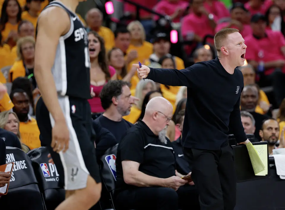 Spurs associate head coach Sean Sweeney yells out instructions during the third quarter of Game 3 of the Western Conference Finals at Frost Bank Center in San Antonio, Friday, May 22, 2026.