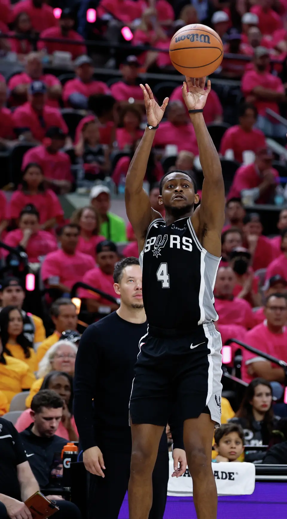 San Antonio Spurs guard De'Aaron Fox (4) takes a three point shot during the second half of Game 3 of the Western Conference Finals at Frost Bank Center in San Antonio, Friday, May 22, 2026. The Spurs fell 123-108 to the Thunder, who now lead the series 2-1.