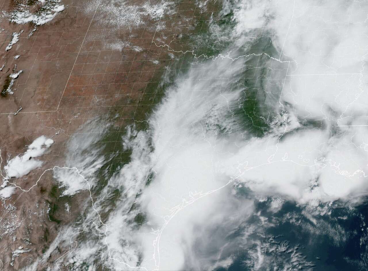 Shown was the satellite image over Texas at 2 p.m. Saturday afternoon, as widely scattered thunderstorms moved over Houston.