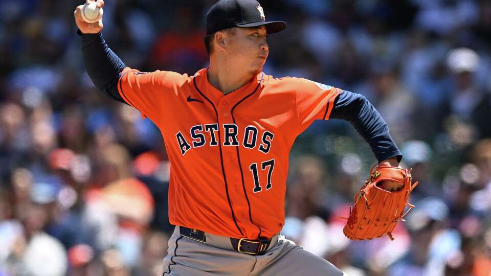 Houston Astros starter Kai-Wei Teng delivers a pitch during the first inning of a baseball game against the Chicago Cubs in Chicago, Saturday, May 23, 2026. (AP Photo/Paul Beaty)