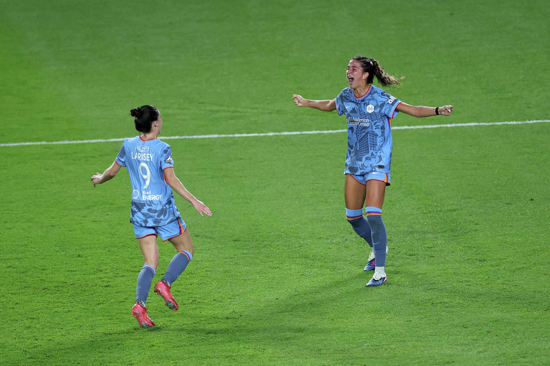 The Dash's Maggie Graham (right) celebrates scoring the winning goal with teammate Clarissa Laris­ey #9 during Saturday's victory over Angel City FC.