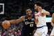 Cleveland Cavaliers guard Donovan Mitchell (45) controls the ball against New York Knicks guard Landry Shamet (44) during the second half of Game 3 in the Eastern Conference finals NBA basketball playoffs series in Cleveland, Monday, May 24, 2027.