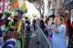 Maria Candelaria-Villegas dances on the sidelines as the 48th annual Carnaval San Francisco parade goes down 24th Street.