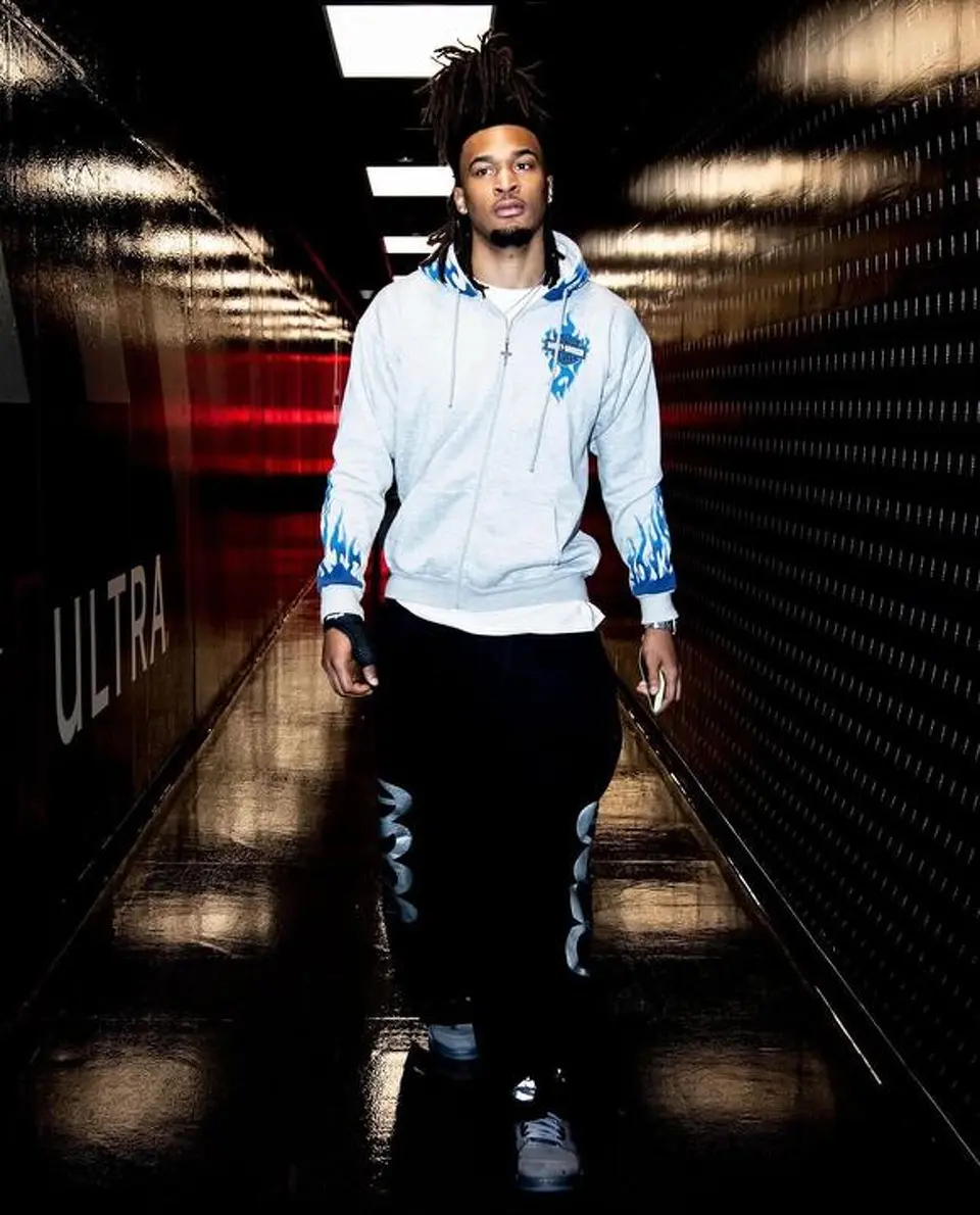 Stephon Castle arrives wearing a Harley-Davidson flame hoodie before Game 4 of the Western Conference finals against the Oklahoma City Thunder at Frost Bank Center.