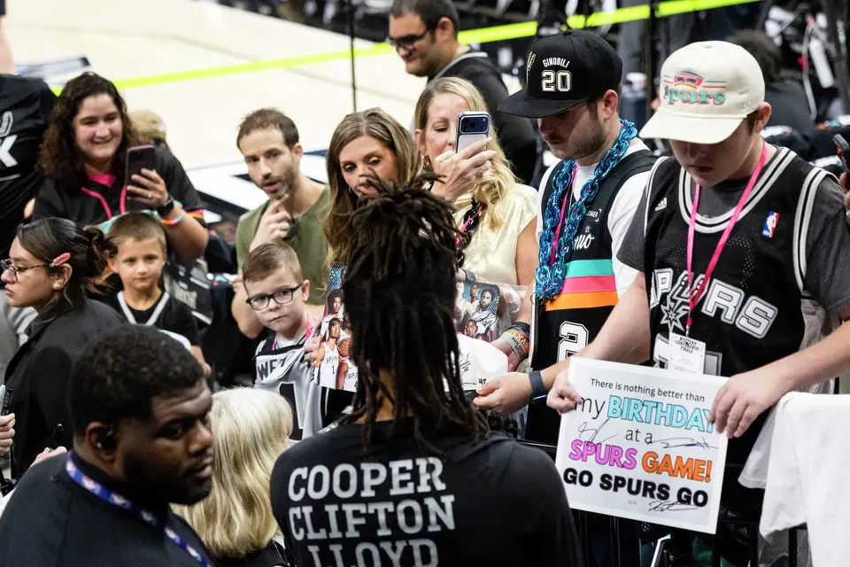 San Antonio Spurs guard Stephon Castle (5) signs autographs for fans prior to the start of Game 4 of the Western Conference Finals at Frost Bank Center in San Antonio on Sunday, May 24, 2026.