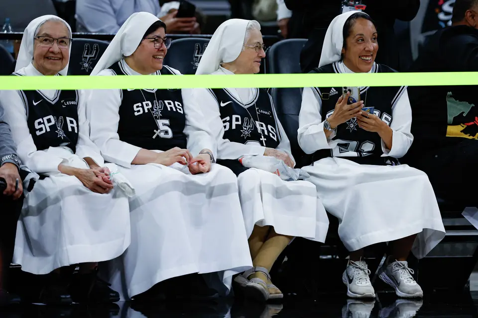 Salesian Sisters of St. John Bosco watch the San Antonio Spurs warm up before Game 4 of the Western Conference Finals at Frost Bank Center in San Antonio, Sunday, May 24, 2026.