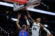 San Antonio Spurs guard Devin Vassell (24) blocks the shot of Oklahoma City Thunder guard Jared McCain (3) during the first quarter of Game 4 of the Western Conference Finals at Frost Bank Center in San Antonio, Sunday, May 24, 2026.