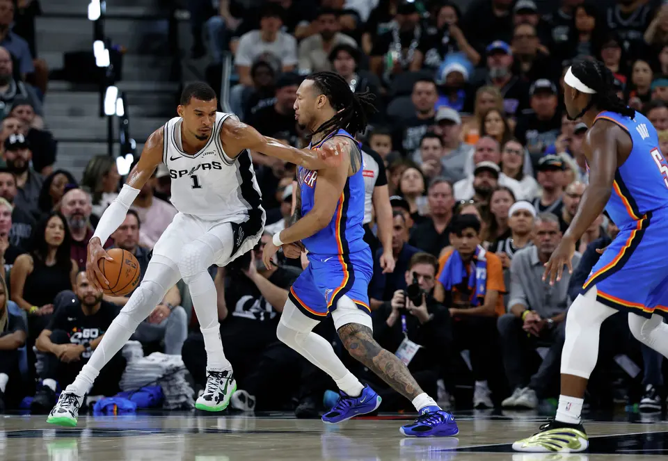 San Antonio Spurs forward Victor Wembanyama (1) pushes off of Oklahoma City Thunder forward Jaylin Williams (6) during the first quarter of Game 4 of the Western Conference Finals at Frost Bank Center in San Antonio, Sunday, May 24, 2026.