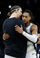 San Antonio Spurs forward Kelly Olynyk (8) celebrates with San Antonio Spurs guard Devin Vassell (24) at the end second quarter with the Spurs headed to the locker room with a sizable lead over the Oklahoma Thunder in Game 4 of the Western Conference Finals at Frost Bank Center in San Antonio, Sunday, May 24, 2026.