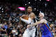 San Antonio Spurs guard Devin Vassell (24) protects the ball from Oklahoma City Thunder guard Alex Caruso (9) during the second quarter of Game 4 of the Western Conference Finals at Frost Bank Center in San Antonio, Sunday, May 24, 2026.