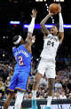 San Antonio Spurs guard Devin Vassell (24) pulls up for a jump shot over Oklahoma City Thunder guard Shai Gilgeous-Alexander (2) during the third quarter of Game 4 of the Western Conference Finals at Frost Bank Center in San Antonio, Sunday, May 24, 2026.