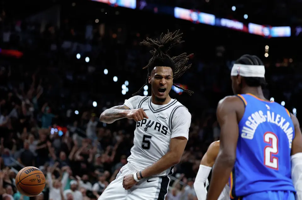 San Antonio Spurs guard Stephon Castle (5) gives Oklahoma City Thunder guard Shai Gilgeous-Alexander (2) a hard stare after he dunked the ball during the third quarter of Game 4 of the Western Conference Finals at Frost Bank Center in San Antonio, Sunday, May 24, 2026.