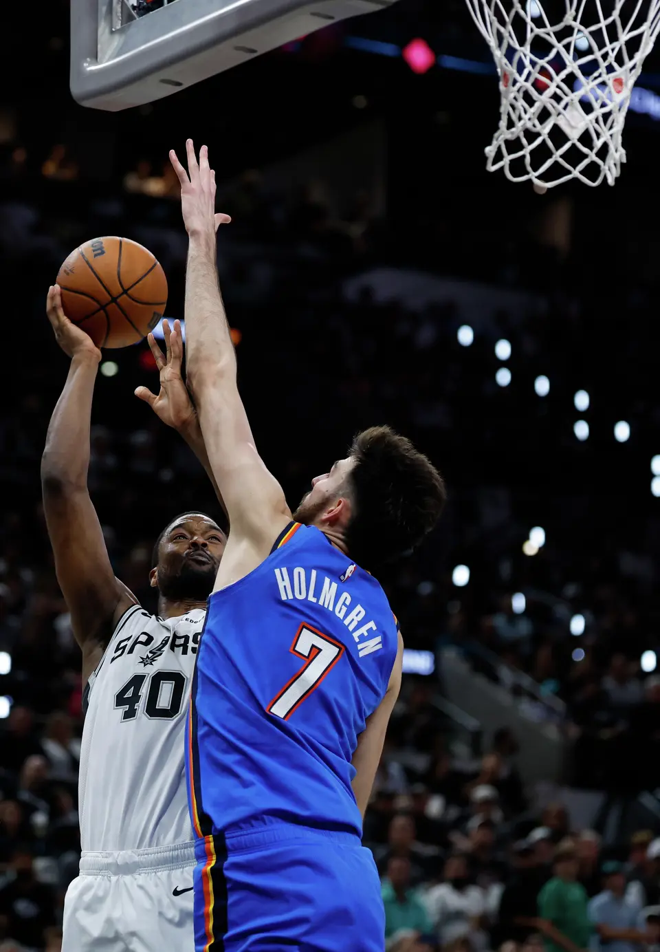 San Antonio Spurs forward Harrison Barnes (40) takes a jump shot as Oklahoma City Thunder center Chet Holmgren (7) guards him during the third quarter of Game 4 of the Western Conference Finals at Frost Bank Center in San Antonio, Sunday, May 24, 2026.