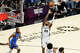 San Antonio Spurs guard Devin Vassell (24) reaches for the ball during Game 4 of the Western Conference Finals at Frost Bank Center in San Antonio on Sunday, May 24, 2026.