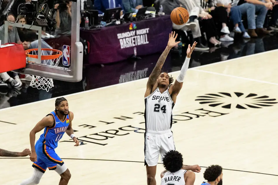 San Antonio Spurs guard Devin Vassell (24) reaches for the ball during Game 4 of the Western Conference Finals at Frost Bank Center in San Antonio on Sunday, May 24, 2026.