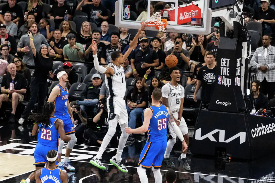Fans react as San Antonio Spurs center Victor Wembanyama (1) dunks the ball during Game 4 of the Western Conference Finals at Frost Bank Center in San Antonio on Sunday, May 24, 2026.