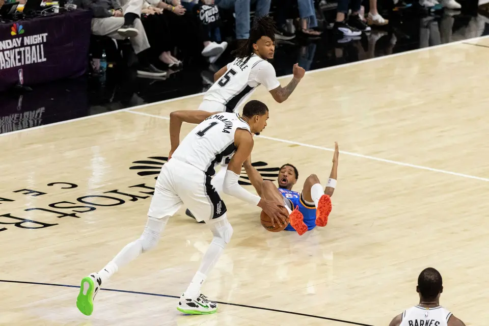 Oklahoma City Thunder guard Aaron Wiggins (21) reacts as San Antonio Spurs center Victor Wembanyama (1) takes the ball during Game 4 of the Western Conference Finals at Frost Bank Center in San Antonio on Sunday, May 24, 2026.