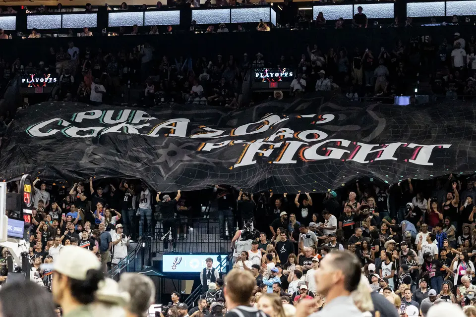 Fans wave a flag during Game 4 of the Western Conference Finals at Frost Bank Center in San Antonio on Sunday, May 24, 2026.