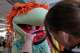 Sarah Lafferty, right, fits a mouthpiece on "Boober," a character in the "Jim Henson's Fraggle Rock: Back to the Rock Live" show, at Jim Henson's Creature Shop in New York, Wednesday, May 13, 2026.