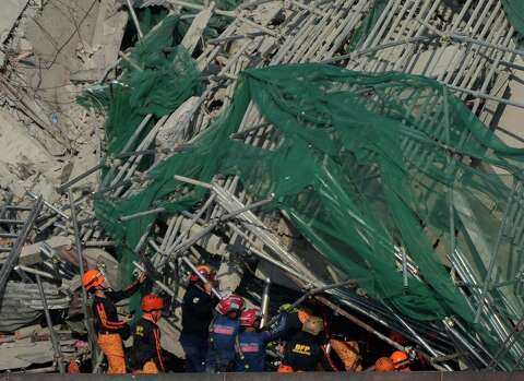 4 dead, 17 mostly workers still missing, in collapse of unfinished ...