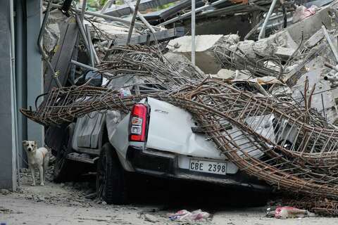 Photos show the aftermath of a building collapse in the Philippines