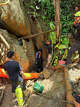 In this release Metta Tham Rescue Kalasin, rescuers work to reach seven people who have been trapped in a cave in Xaisomboun province, Laos, Monday, May 25, 2026. (Metta Tham Rescue Kalasin via AP)