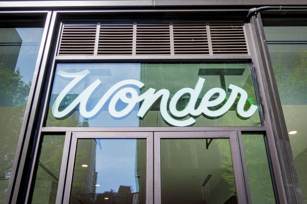 Sign at the entrance to the Wonder store in Midtown Manhattan, N.Y., on Sept. 15, 2025. The food hall/delivery chain is expanding further into Texas, including Austin and Houston, according to recent permit filings.