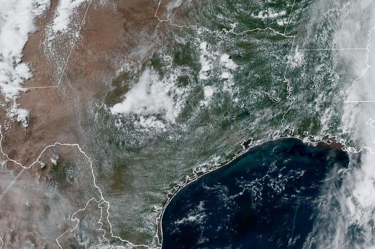 Much of Texas enjoyed mostly clear skies on Memorial Day, as seen in this weather satellite photo taken around 2:30 p.m. Monday. Houston will be mostly dry Tuesday before rain is expected overnight.