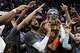 New York Knicks center Karl-Anthony Towns, center, and teammates celebrate after winning Game 4 in the Eastern Conference finals NBA basketball playoffs series against the Cleveland Cavaliers in Cleveland, Monday, May 25, 2026.