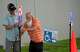Poll workers at the Sunnyside Multi-Service Center set up the area for curbside voting during the primary runoff election in Houston Tuesday, May 26, 2026.