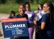 Letitia Plummer campaigns for Harris County Judge outside the Sunnyside Multi-Service Center during the primary runoff election in Houston Tuesday, May 26, 2026.