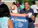 Letitia Plummer campaigns for Harris County Judge outside the Sunnyside Multi-Service Center during the primary runoff election in Houston Tuesday, May 26, 2026.