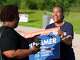 Letitia Plummer campaigns for Harris County Judge outside the Sunnyside Multi-Service Center during the primary runoff election in Houston Tuesday, May 26, 2026.