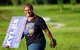 Ysidera “Sissy” Kyles campaigns for the 209th District Court Judge outside the Sunnyside Multi-Service Center during the primary runoff election in Houston Tuesday, May 26, 2026.