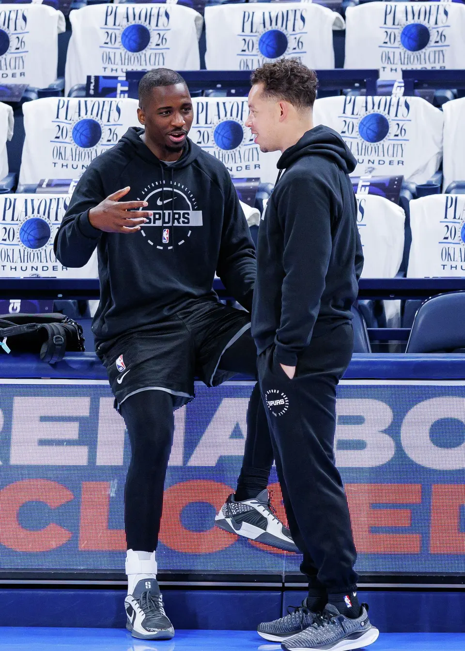 San Antonio Spurs forward David Jones Garcia, left, talks to head coach Mitch Johnson during shootaround at Paycom Center in Oklahoma City, Tuesday, May 26, 2026, as the team prepares for Game 5 of the Western Conference Finals against the Oklahoma City Thunder.