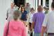 People are shown outside the West Gray Metropolitan Multi-Service Center, a polling site for the Texas primary runoff election, in Houston on Tuesday, May 26, 2026.