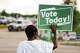 A political supporter holds up a sign that reads “Vote Today” across from the Sunnyside Health and Multi-Service Center on Election Day in Houston, Tuesday, May 26, 2026.