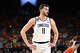 INDIANAPOLIS, INDIANA - APRIL 04: Alex Karaban #11 of the Connecticut Huskies takes a breather in the second half against the Illinois Fighting Illini in the Final Four.