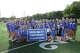 The Mercy girls pose with the championship banner and plaque after winning the team title at the Southern Connecticut Conference outdoor track and field championships on Tuesday, May 26, 2026, at Amity Regional High School in Woodbridge.
