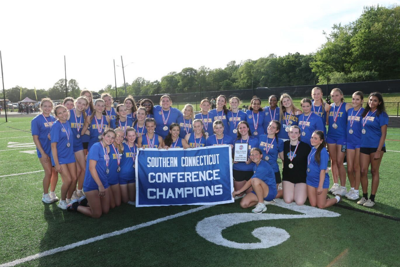 Mercy wins final relay in record time to capture second straight SCC title