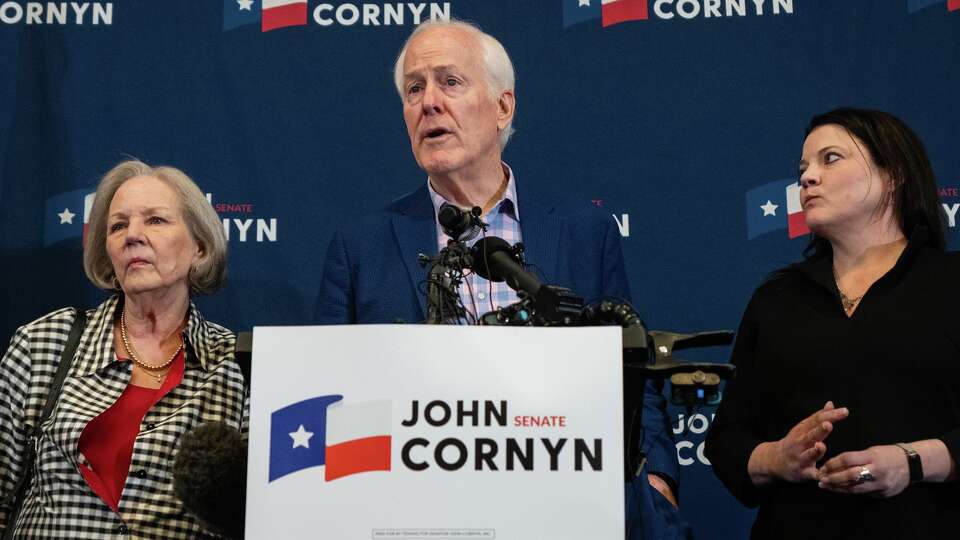 Sen. John Cornyn speaks to members of the press, alongside his wife, Sandy Cornyn and daughter, Haley Cornyn, after losing the GOP nomination to Ken Paxton in Austin, Tuesday, May 26, 2026.